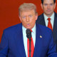 Trump addresses the nation from a lectern at the White House.