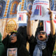 Iranians gather at the Revolution Square in Tehran to protest US attacks
