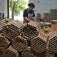 Workers make fireworks in a factory, in Liuyang, Hunan Province