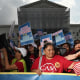 Demonstrators rally outside the Supreme Court in support of birthright citizenship 
