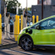 A Chevrolet Bolt charges at a ChargePoint electric vehicle charging station.