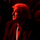 Donald Trump in red lighting.