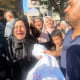 Nasar Sebetaa, right, carries the body of his niece, Yaqeen, a 5-month-old killed with her parents in an Israeli strike on Gaza.