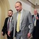 Dan Bongino walks in the Capitol.