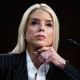 Pam Bondi  listens during her confirmation hearing.