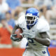 Kentucky Wildcats wide receiver  Scott Mitchell holds the ball during a game.