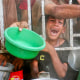 Palestinians shove to receive a hot meal at a charity kitchen.