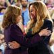 Beyonce and Kamala Harris embrace at a campaign rally.