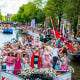 Boats on the Amstel river during Pride.