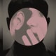 Photo illustration of shadowy man overlaid with image of woman whispering 