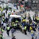 Medical workers aid injured people at the finish line 