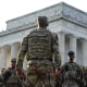 Members of the National Guard  standing at the National Mall