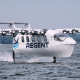 The REGENT Viceroy Seaglider, a winged passenger ferry, glides over the surface of Narragansett Bay