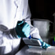 A researcher works in the lab at the Moderna Inc. headquarters in Cambridge, Mass., March 26, 2024. 