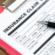 An Insurance claim form on a table