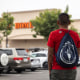 A day laborer waits in the parking lot of a Home Depot as federal immigration conducts raids in Los Angeles on June 20, 2025.   
