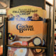 A cracker barrel menu sits on a shelf