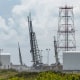 Three sounding rockets for the TOMEX+ mission are raised vertical on their launch pads 
