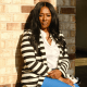 Lakeita Williams outside the home she resided in during the events of Hurricane Katrina