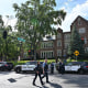 Police and first responders work at the scene of a shooting near Annunciation Church and Catholic School in Minneapolis, Minneosta, on August 27, 2025. 