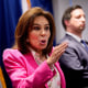 U.S. Attorney for the District of Columbia Jeanine Pirro speaks at a news conference in front of a display of seized guns on Aug. 26, 2025.