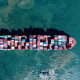 A container ship sails out of the port in Qingdao, China, on Sept. 4, 2025. 