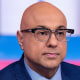 Ali Velshi; President Donald Trump holds a chart on household income.
