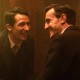 From left, Josh O'Connor and Paul Mescal laugh together, facing each other