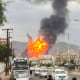 Flames and smoke rise following Israeli airstrikes in Sanaa, Yemen