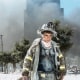A New York City firefighter walks away from Ground Zero 