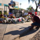 Arizonans mourn Charlie Kirk outside of the Turning Point USA headquarters on Sept. 12, 2025 in Phoenix.