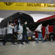 Hyundai workers arrive back in south Korea