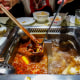 Spicy hotpot in a Hai Di Lao restaurant.  Hai Di Lao Hot Pot