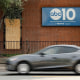 A window is was covered by a board after it was stuck by gunfire at ABC10 (KXTV) in Sacramento, Calif.,,on Sept. 19, 2025.  