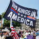 People take part in a "No Kings" protest.