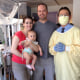 Jeff, Caroline and Eliana with Dr. Kohn before she underwent gene therapy for ADA-SCID.