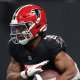 Christian McCaffrey #23 of the San Francisco 49ers; Bijan Robinson #7 of the Atlanta Falcons.