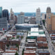 An aerial view of the city center of Kansas City, Mo., many buildings and streets and cars