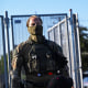 Federal Agents stand outside the Immigration and Customs Enforcement facility.