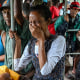 A woman reacts on the bus as residents are evacuated to safe locations ahead of the arrival of Hurricane Melissa.