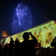 Lightning effects depicting the funerary mask of ancient Egyptian King Tutankhamun light up the sky during the opening ceremony of the Grand Egyptian Museum