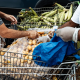 Volunteers pack bags of groceries to distribute to the local community for their daily food pantry in Philadelphia, P.A.