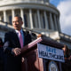 House Minority Leader Hakeem Jeffries conducts a rally at the Capitol to oppose the Senate-passed spending bill that would reopen the government because it does not extend the the Affordable Care Act tax credits.