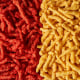 Cheetos Flamin’ Hot Crunchy, left, next to new Simply NKD Cheetos Flamin’ Hot Crunchy.