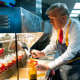 Donald Trump works behind the counter during a campaign event at McDonald's restaurant in Feasterville-Trevose, P.A.