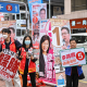 Supporters campaign for their candidates in the Legislative Council elections in Wanchai district of Hong Kong on Dec. 7.