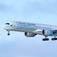 A Cathay Pacific Airlines plane in the air