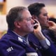 Traders work on the floor of the New York Stock Exchange