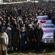 Mourners attend the funeral of Shiite Muslims, a day after a suicide bombing at a mosque in Islamabad on February 7.