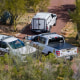 Pima County Sheriff officers and cars appear to be parked on Nancy Guthrie's property.